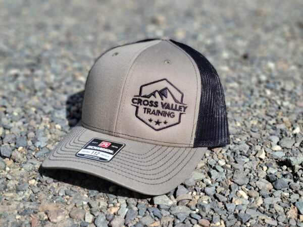 Black snap back hat with Cross Valley Training logo